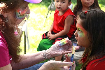 &lt;p class=&quot;p1&quot;&gt;Dottie Olafson of Missoula paints six-year-old Natayla Stevens' &#160;face at Dixon Melon Day.&lt;/p&gt;