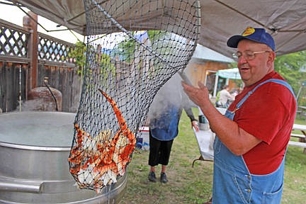 &lt;p&gt;Super volunteer Jack Fay dunks some crispy crab legs. Fay and his wife were the Grand Marshalls of the Ronan Pioneer Days Parade. See his story on A6.&lt;/p&gt;