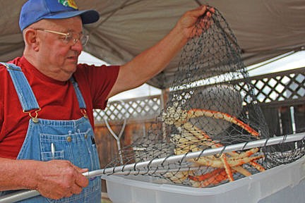 &lt;p&gt;Super volunteer Jack Fay dunks some crispy crab legs. Fay and his wife were the Grand Marshalls of the Ronan Pioneer Days Parade. See his story on A6.&lt;/p&gt;