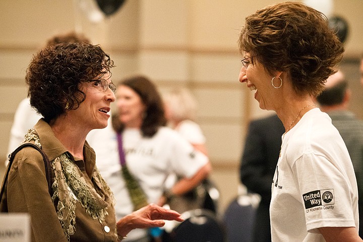 &lt;p&gt;SHAWN GUST/Press Joyce Barton, right, mingles with Gail McGaughey following grant presentations at the United Way of Kootenai County's Campaign Celebration and Grant Awards Luncheon Wednesday in Coeur d'Alene. Barton and her husband Rick were named as the 2012 fundraising campaign co-chairs during the event.&lt;/p&gt;