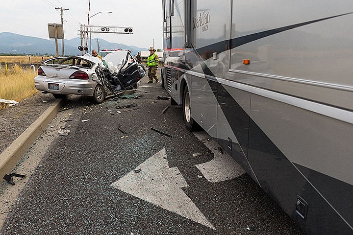 &lt;p&gt;Crews from Kootenai County Fire and Rescue work the scene of a two-car collision occurred Monday afternoon near the intersection of Pleasant View Road and Prairie Avenue in Post Falls. According to a Kootenai County Sheriff&#146;s Office spokesman, the driver of a passenger vehicle collided with an RV after swerving to avoid a third vehicle that failed to yield at a stop sign. One adult female passenger was transported to Kootenai Health with possible life-threatening injuries after being extricated from the vehicle. An investigation is currently underway&lt;/p&gt;