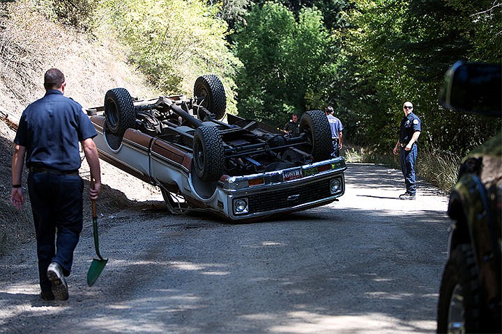 &lt;p&gt;A truck comes to rest on its top on Nettleton Gulch Road Wednesday in Coeur d&#146;Alene. No injuries were reported.&lt;/p&gt;