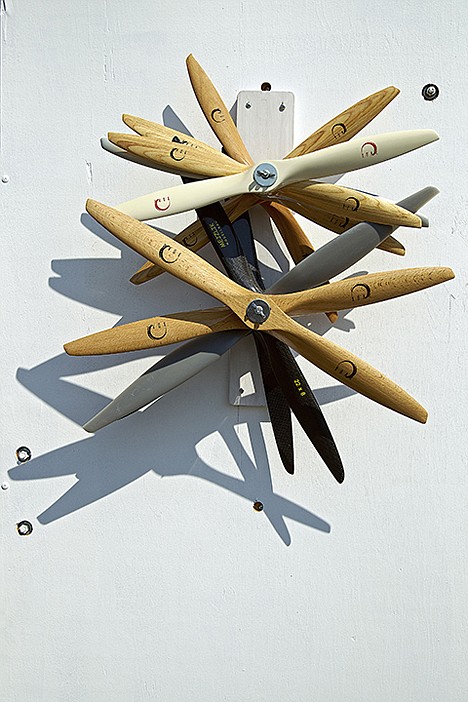 &lt;p&gt;Propellers for remote control planes hang from the door of a trailer used for transporting the hobby pieces.&lt;/p&gt;