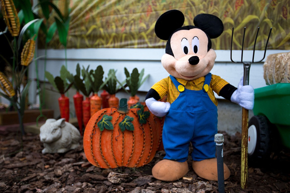 &lt;p&gt;Near the front door of the White residence in Hayden, a stuffed Mickey Mouse doll stands next to metal pumpkins and carrots as it holds a pitchfork hand-crafted by Fred White himself.&lt;/p&gt;