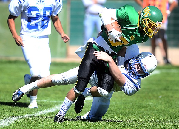 &lt;p&gt;Whitefish senior wide receiver Sean Foley (3) is finally brought down by a Havre defender during their game on Saturday, August 31, in Whitefish. Whitefish won the match up 45 to 27. (Brenda Ahearn/Daily Inter Lake)&lt;/p&gt;