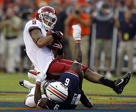 &lt;p&gt;Washington State wide receiver Gabe Marks (9) catches a pass over Auburn defensive back Jonathon Mincy (6) for a first down during the first half Saturday in Auburn, Ala.&lt;/p&gt;