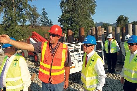 ITD District Engineer Ken Sorensen shows Sen. Jim Risch, R-Idaho, a portion of the Sand Creek Byway project on Monday. (Photo by DAVID KEYES)