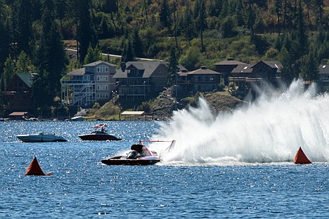 &lt;p&gt;Jimmy Shane leads the pack in the Graham Trucking hydroplane Saturday in the H1 unlimited heat 1A, ultimately coming in first place in the heat.&lt;/p&gt;