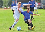 Boys lose opener, but tie Bigfork