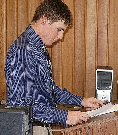 First-year teacher Kelly Morford studies his notes Wednesday just minutes before his initial class session at Libby High School.