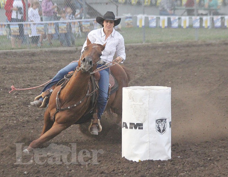 &lt;p&gt;Charlo barrel racer Becky Jo Dumont turns the final corner on her mount.&lt;/p&gt;