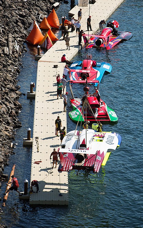 &lt;p&gt;Pit crews prepare their boats and drivers for racing after being lowered in the lake at Silver Beach.&lt;/p&gt;