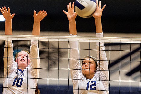 &lt;p&gt;Coeur d&#146;Alene High School&#146;s Ali Williams (10) and Sydney Bybee (12) go up for a block at the net during the second set against Lake City Tuesday in Coeur d&#146;Alene.&lt;/p&gt;