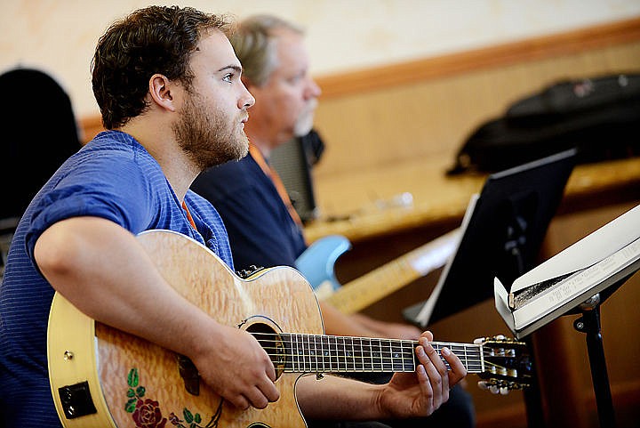 <p><strong>Local musician</strong> Colten Christensen listens to Jared Meeker during his Personalize Rock and Blues class at the Crown of the Continent Guitar Workshop on Tuesday, September 1, in Bigfork. (Brenda Ahearn/Daily Inter Lake)</p>