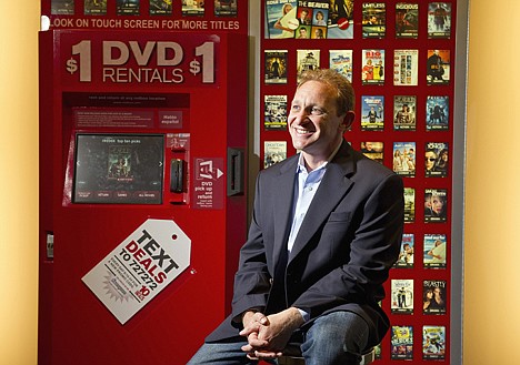 &lt;p&gt;Gary Cohen, senior vice president of marketing and customer experience at Redbox, poses by at a working kiosk at the company's offices in Oakbrook Terrace, Ill., on Aug. 26. Redbox is looking to pick up new customers with rival Netflix poised to raise its prices by as much as 60 percent for its existing subscribers.&lt;/p&gt;