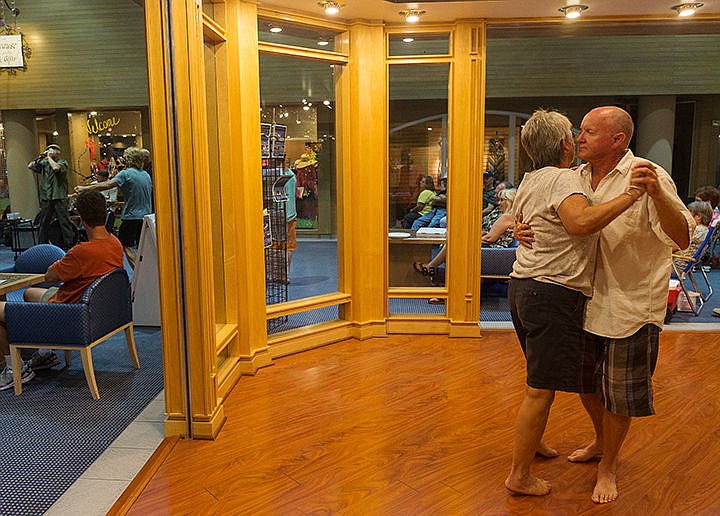 &lt;p&gt;SHAWN GUST/Press&lt;/p&gt;&lt;p&gt;Mercy Jacobsen and her husband Joel dance in a vacant shop space Tuesday as the band Bakin&#146; Phat plays in the Coeur d&#146;Alene Resort Plaza Shops. The free concert, normally performed at Sherman Square Park, was moved due to inclement weather.&lt;/p&gt;