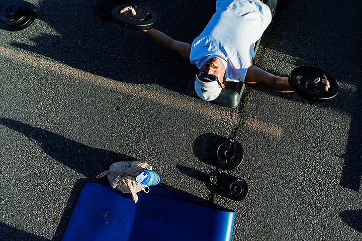 &lt;p&gt;SHAWN GUST/Press&lt;/p&gt;&lt;p&gt;Stu Miller lifts weights from a laying position Thursday during the Pump in the Park fundraiser at Peak Health and Wellness in Post Falls. The event benefits the Boys and Girls Club of Kootenai County.&lt;/p&gt;