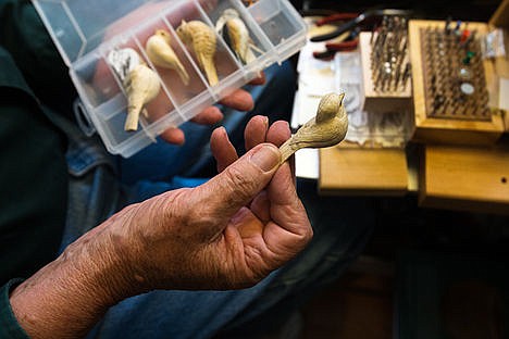 &lt;p&gt;George R. Wilson shows off the fourth step in his progression of carving a songbird in his home studio in Coeur d&#146;Alene. Wilson has been wood carving since the early 1970&#146;s.&lt;/p&gt;
