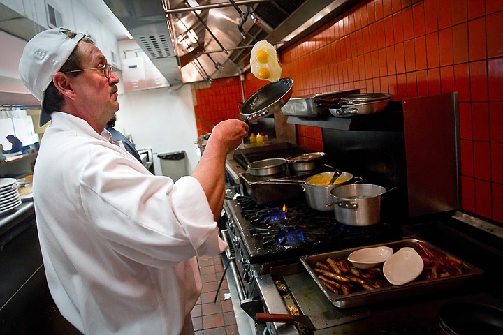 &lt;p&gt;Chris Taylor flips an order of eggs Friday during the end of the breakfast rush at the recently opened Sherman Junction in downtown Coeur d'Alene.&lt;/p&gt;