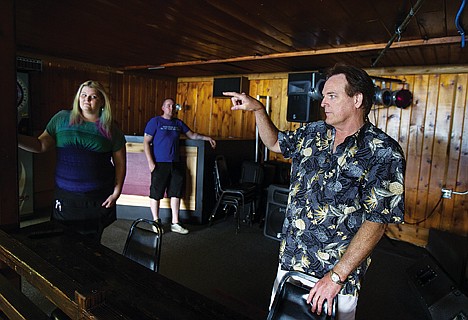 &lt;p&gt;Vern Mathis points out where a false wall can come down and create a secret wall which was used during the prohibition era at Blackjack Lil's, a new restaurant and bar which opened in Hauser Lake last month.&lt;/p&gt;