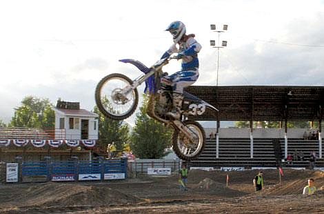 Jason Shueh/Valley Press Rider Tyler Deprez, from Heron, gets some air over the large crowd pleasing table top jump