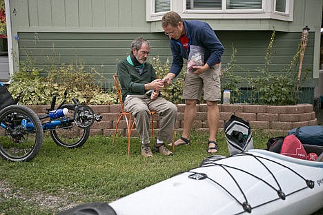 &lt;p&gt;Mike Yochim, 47, a National Parks Service planner, left, helps his friend Eric Compas decide on the meals to carry for a canoe trip on Aug. 20 in Gardiner, Mont. Yochim was diagnosed with Amyotrophic lateral sclerosis (ALS) in September 2013 and will be joined by three of his closest friends for one last wilderness trip around Yellowstone Lake.&lt;/p&gt;