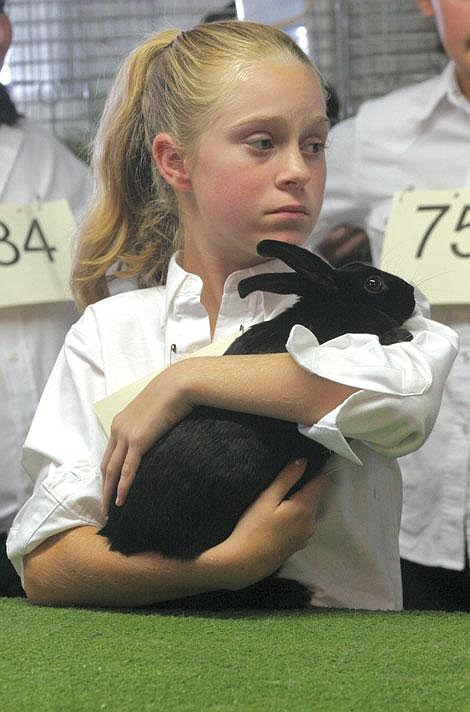 Jamie Doran/Valley Press Abigail Croft holds her rabbit Midnight.