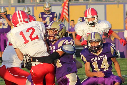 &lt;p&gt;Polson's Jacob Clairmont makes a tackle for a loss on Raymond's Brady Sillito.&lt;/p&gt;