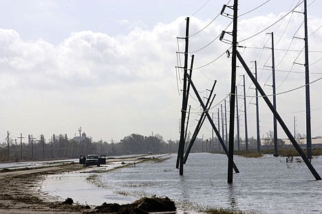 &lt;p&gt;A truck is stranded from receding flood waters from Hurricane Isaac along Louisiana Hwy 23 near Port Sulphur, La., in Plaquemines Parish, Monday, Sept. 3, 2012. The nation?s oil and gas hub is slowly coming back to life in the aftermath of Hurricane Isaac. The government said Monday that offshore oil and gas platforms are beginning to ramp up production as crews are returning. (AP Photo/Matthew Hinton)&lt;/p&gt;
