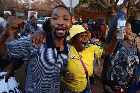 &lt;p&gt;Released mine worker Nkosibongile Momaphela, left, celebrates with his sister Nomfundo Jali, right, after he was released along with other miners at Ga-Rankuwa Magistrate's Court, Pretoria, South Africa, Monday, Sept. 3, 2012. The miners were among those arrested for public violence after the police opened fire on a group of striking mineworkers killing 34 and wounding 78 at Lonmin's Marikana platinum mine on August 16. Last week, prosecutors said the men arrested would be charged with the murder and attempted murder of their colleagues. Following a public outcry the charges were provisionally withdrawn on Sunday. (AP Photo)&lt;/p&gt;