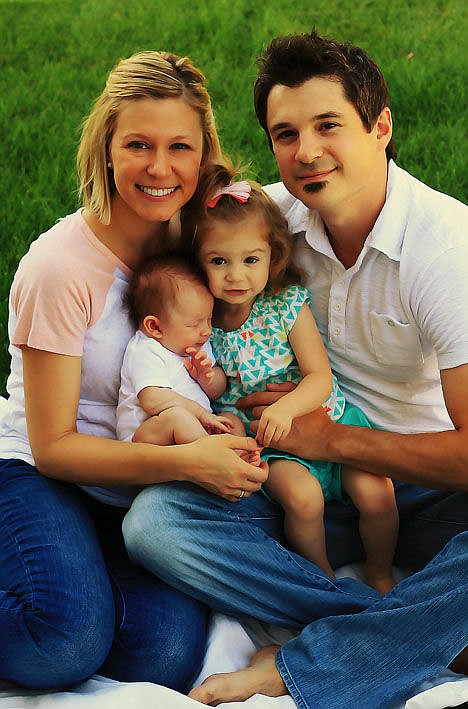 <p>The Sowinski family poses for a portrait. Linsey, a CHS graduate, reports her lymphoma is in remission and her daughter, Lena also has overcome medical difficulties.</p>