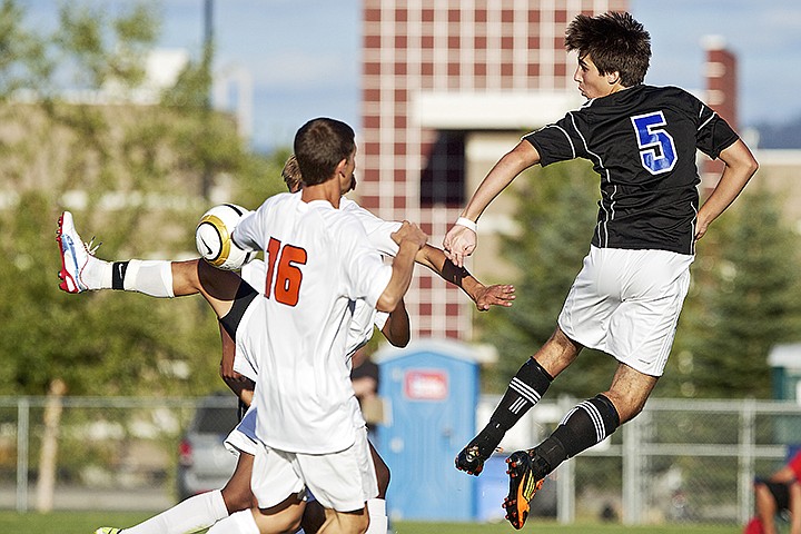 &lt;p&gt;JEROME A. POLLOS/Press Coeur d'Alene High's Dillon Dunteman flies in front of the goal as attempt to help out his goalie by breaking of a play in the second half by a trio of Post Falls High players.&lt;/p&gt;