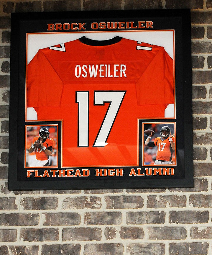 <p>A Brock Osweiler jersey is part of the memorabilia hanging on the walls at the Buffalo Wild Wings. (Aaric Bryan/Daily Inter Lake)</p>