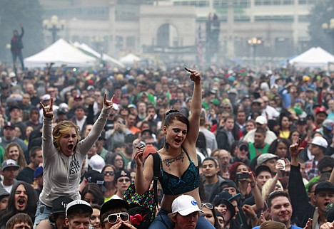 &lt;p&gt;In this April 20 photo, members of a crowd numbering tens of thousands smoke marijuana and listen to live music, at the Denver 420 pro-marijuana rally at Civic Center Park in Denver.&lt;/p&gt;