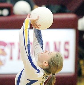 <p>Senior Hannah England setting in second game vs. Troy 9-2-14</p>