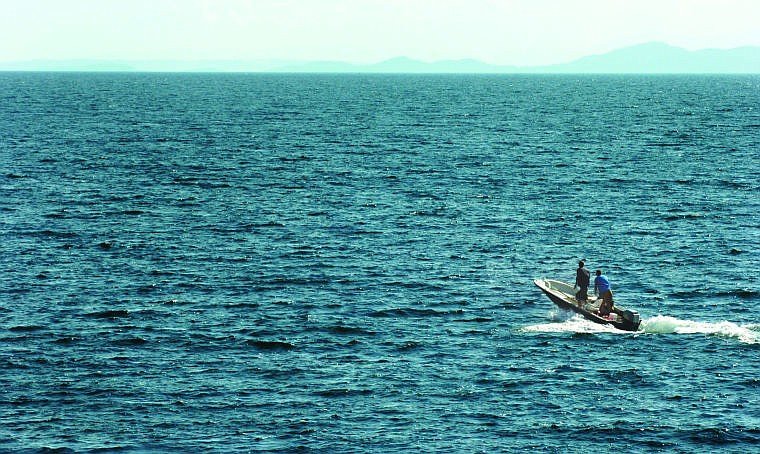 &lt;p&gt;A boat and crew from Flathead Lake Lodge look for swimmers after several dragon boats capsized Friday afternoon on Flathead Lake in Bigfork. The boats were training for the weekend races when waves capsized eight of nine boats in the bay between Wayfarers State Park and Bigfork Bay.&#160;&#160;&lt;/p&gt;