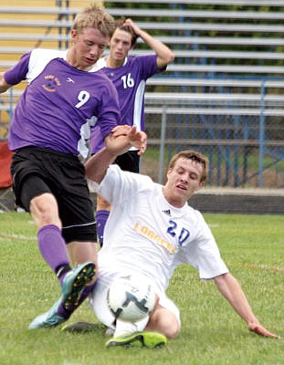 &lt;p&gt;Battle for control with Park High's Clayton Busby, left, and senior midfielder Colin Maloney vs. the Rangers Friday, Sept. 2. (Seaborn Larson/The Western News)&lt;/p&gt;
