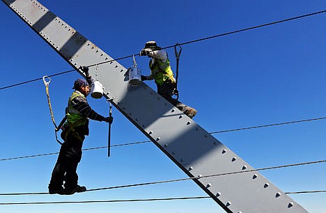 &lt;p&gt;Workers paint the Julien Dubuque Bridge along U.S. 20 in Dubuque, Iowa, on Aug. 24.&#160;&lt;/p&gt;