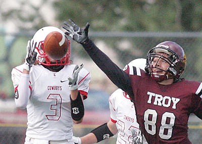 <p>Zach Cotten comes up just short of deflecting the touchdown pass to Conrad's Austin Padilla in first quarter vs. the Cowboys Sept. 2. (Paul Sievers/The Western News)</p>