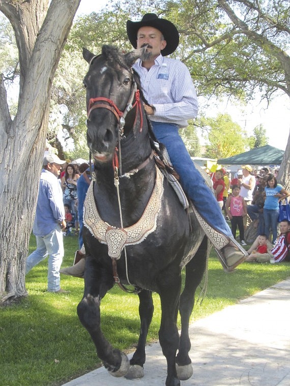 All Photos by Ted Escobar/The Royal Register Angel Farias dances
his horse El Diablo. A major portion of the entertainment was
dancing horses presented by Mexican cowboys who live in the
region.