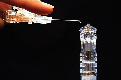 &lt;p&gt;Flu shots have long been injected deep into muscle, requiring a needle an inch long or longer, such as the needle seen at left. However, a new version named: Sanofi Pasteur's Fluzone Intradermal, hitting the market this fall, at right, is less than a tenth of an inch long, the first flu vaccine that works by injecting just into the skin. The new needle is about as long as a single drop of fluid, as demonstrated in Washington, on Tuesday, Aug. 30, 2011. (AP Photo/Jacquelyn Martin)&lt;/p&gt;