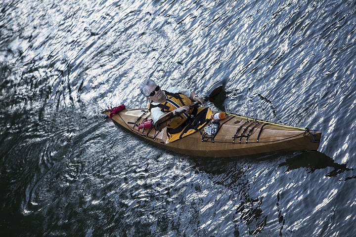 &lt;p&gt;JerrySue Limandri paddles her way up the Spokane River to Lake Coeur d'Alene with other Coeur d'Alene Canoe and Kayak Club goers Thursday evening during Thursday Night Paddle.&lt;/p&gt;