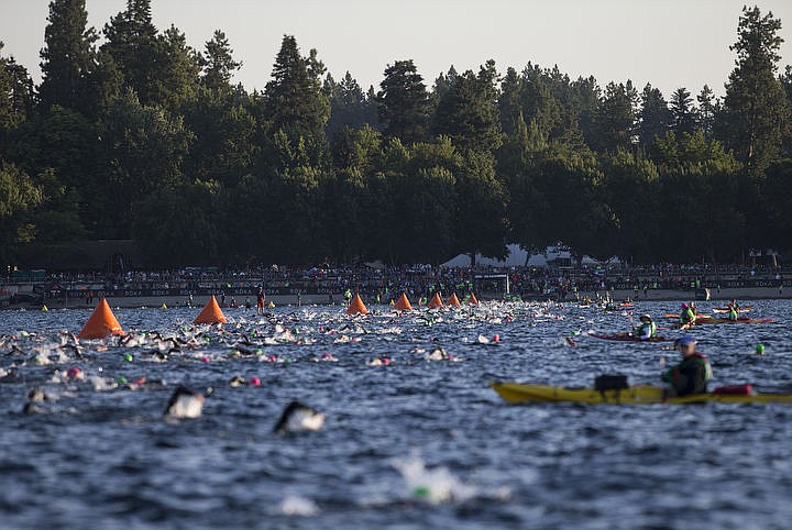 &lt;p&gt;Athletes swim to City Beach during the first leg of Ironman Coeur d'Alene.&lt;/p&gt;