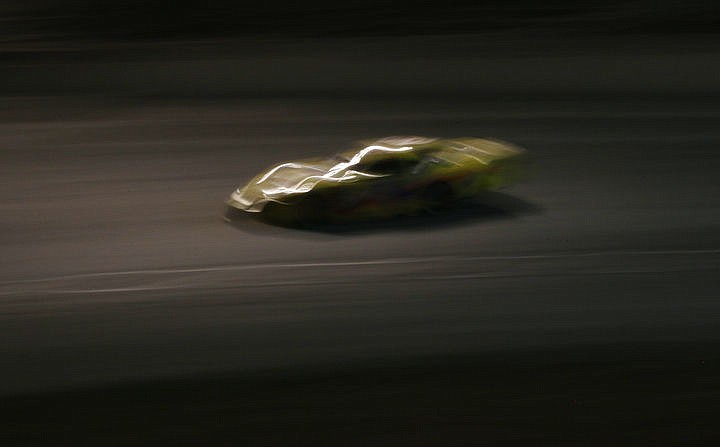 &lt;p&gt;Light reflects off of Barry Shingar's (3) car as he drives into turn three during the Idaho 200 Saturday night at the Stateline Speedway in Post Falls.&lt;/p&gt;