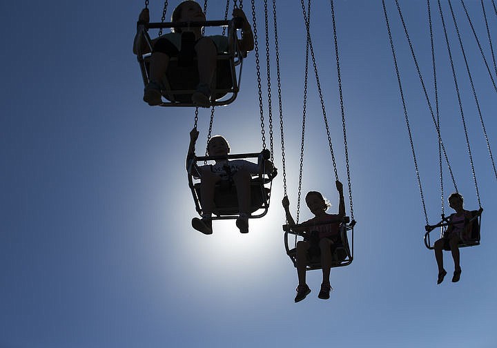 &lt;p&gt;People ride the YoYo at the North Idaho State Fair on Wednesday.&lt;/p&gt;