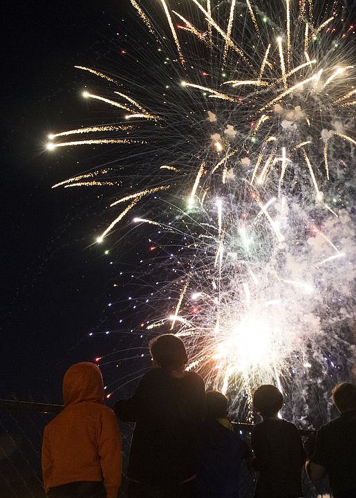 &lt;p&gt;Fair-goers watch fireworks explode over the Kootenai County Fairgrounds during opening night at the North Idaho State Fair Wednesday night.&lt;/p&gt;