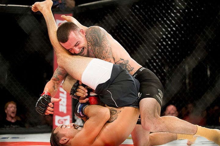 &lt;p&gt;Post Falls' Zach Lari, top, grapples with Tony Sanchezduring the 145 pound MMA fight at King of the Kage on Thursday at the Coeur d'Alene Casino Resort.&lt;/p&gt;