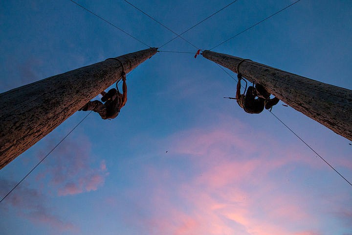 &lt;p&gt;Matt Spink, left, races Sean Yokoyama up a cedar tree trunk using traditional tree climbing spurs on Thursday at the West Coast Lumberjacks Show at the North Idaho State Fair at the Kootenai County Fairgrounds.&lt;/p&gt;