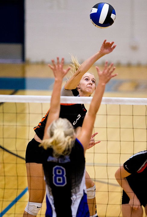 &lt;p&gt;Post Falls senior Brittany Deitz smacks a hard spike over Coeur d'Alene's Carli Daniels on Tuesday at Coeur d'Alene High School.&lt;/p&gt;