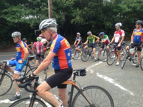 &lt;p&gt;This Aug. 22, 2013 photo, cyclists in the &quot;lawyers ride&quot; wait at the top of NW Thompson and Skyline Blvd. for stragglers before continuing in Portland, Ore.. The Portland lunchtime rides have been going rain or shine for more than 20 years.&lt;/p&gt;